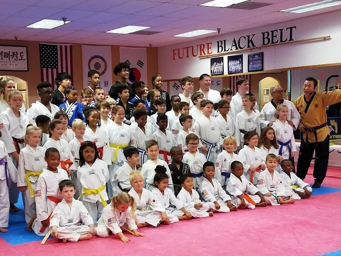 Teen and adult students training together